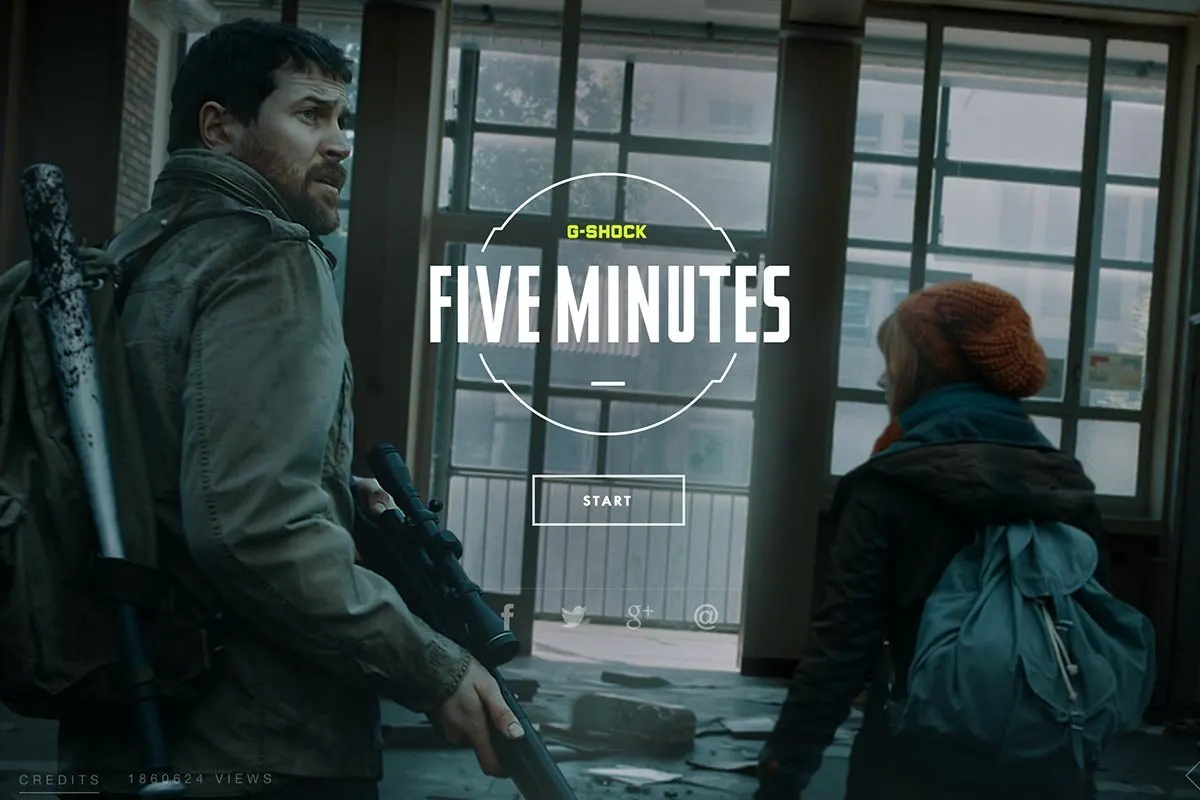 &Eacute;cran d'accueil du film : dans un b&acirc;timent vitr&eacute; et d&eacute;labr&eacute;, un homme arm&eacute; d'un fusil regarde par-dessus son &eacute;paule vers une femme au bonnet orange ; au centre, le titre &laquo; Five Minutes &raquo; et un bouton &laquo; Start &raquo;